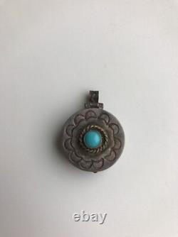 A Vintage Navaho Silver And Turquoise Pendant
