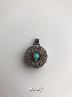 A Vintage Navaho Silver And Turquoise Pendant