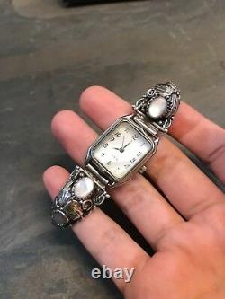 NAVAJO NATIVE AMERICAN STERLING SILVER VINTAGE MOP PAWN WATCH, signed SY