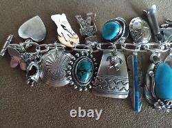 Vintage Navajo Zuni Native American Sterling Silver Turquoise 25 Charm Bracelet