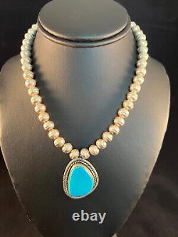 Vintage turquoise necklace featuring handmade sterling Navajo pearls size 15